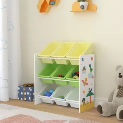 Kinderregal Muxía Mit 9 Aufbewahrungsboxen Spielzeugregal Mit Dinosaurier-Motiv Spielregal Weiß Grün Gelb Kinderzimmer Organizer